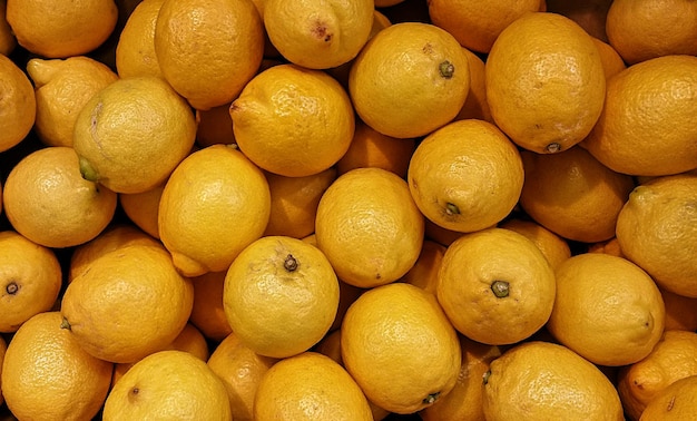 Full frame shot of lemons for sale at market