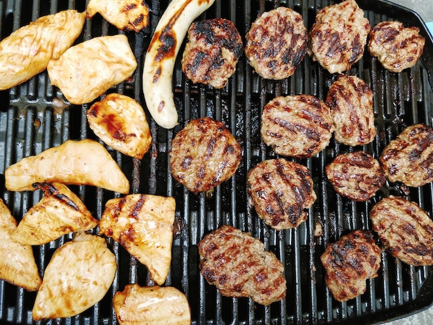 full frame shot of meat on barbecue grill