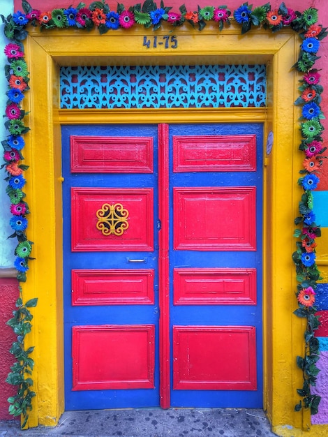 Photo full frame shot of multi colored closed door