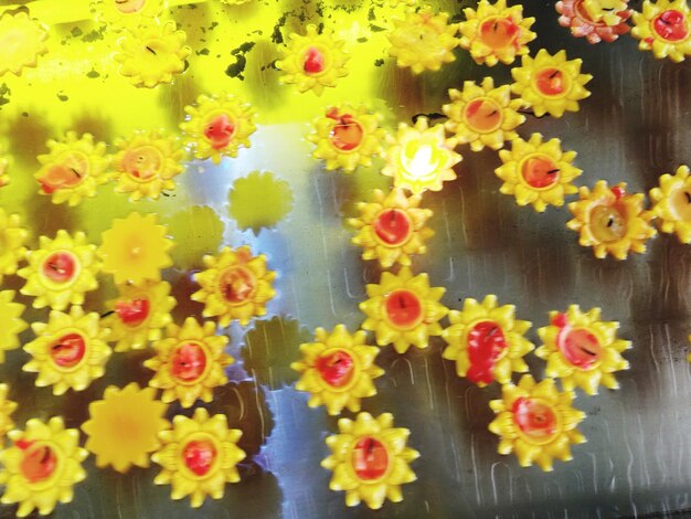 Full frame shot of multi colored flowers on table