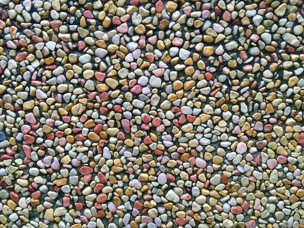 full frame shot of multi colored stone wall