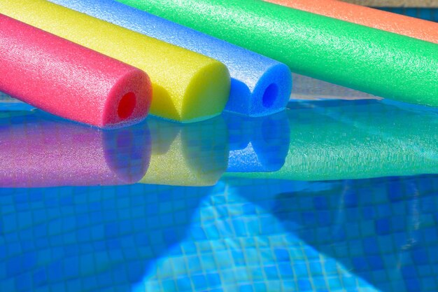 Full frame shot of multi colored toy on swimming pool