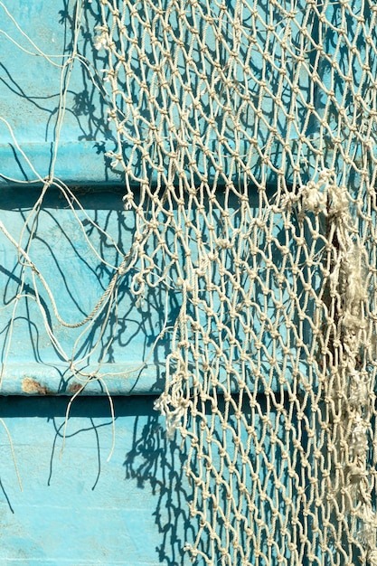 Photo full frame shot of nets against wall