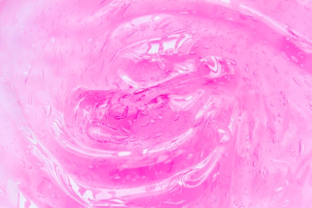 写真 湿ったピンクの塗料のフルフレームショット