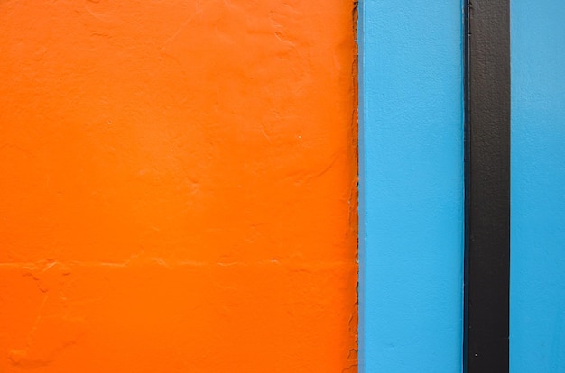 Photo full frame shot of orange and blue wall