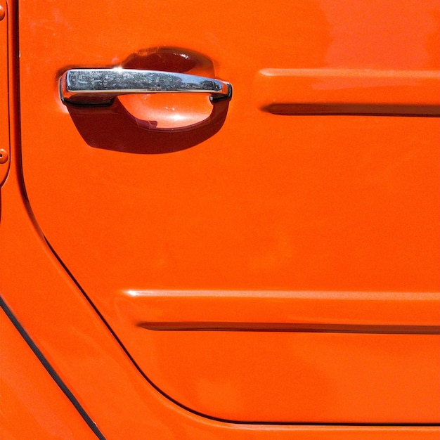 Photo full frame shot of orange car door