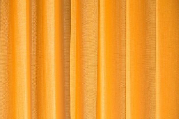 Photo full frame shot of orange curtain