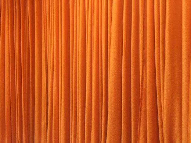 Photo full frame shot of orange curtain