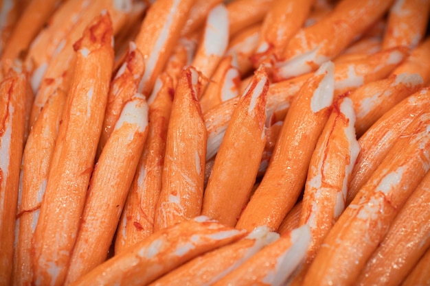 Full frame shot of orange vegetables in market