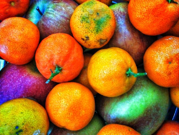 Full frame shot of oranges and apples