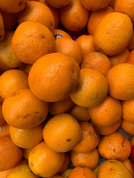 Full frame shot of oranges at market stall