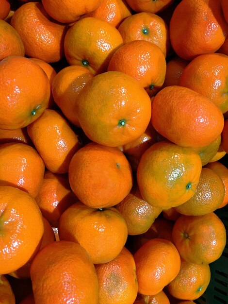 Full frame shot of oranges at market stall