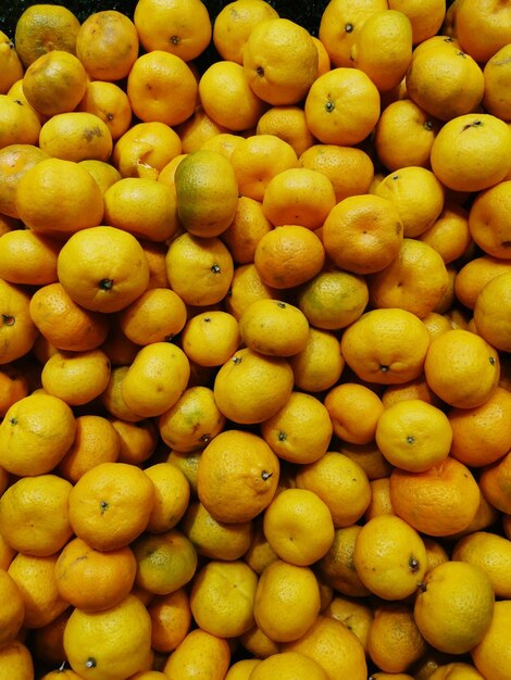 Full frame shot of oranges at market stall