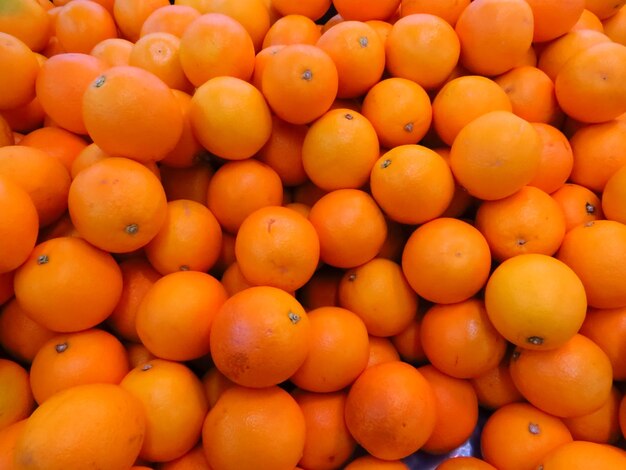 Full frame shot of oranges in market