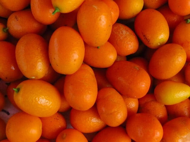 Full frame shot of oranges in market