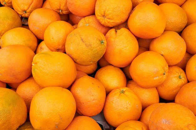 Full frame shot of oranges in market