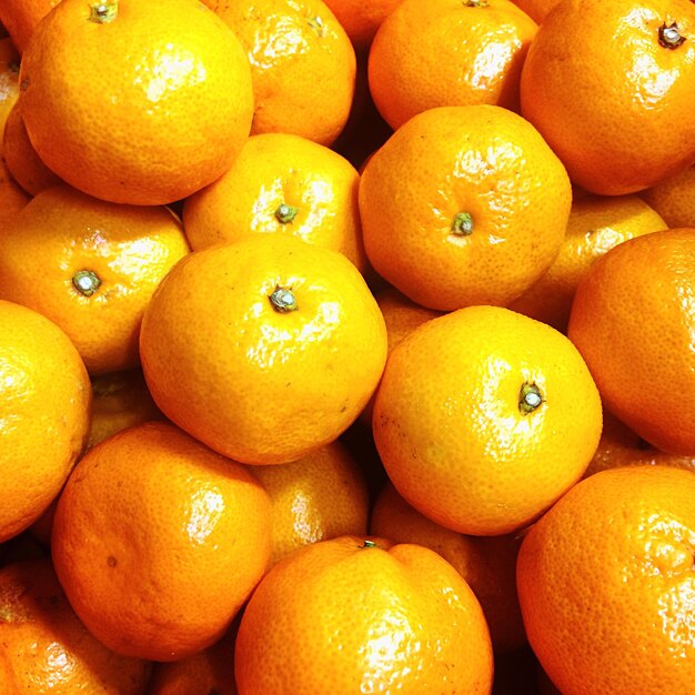 Full frame shot of oranges for sale at market