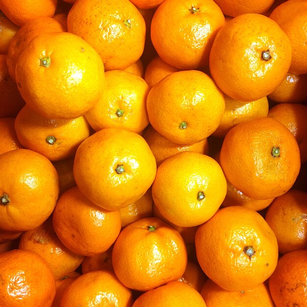 Full frame shot of oranges for sale at market