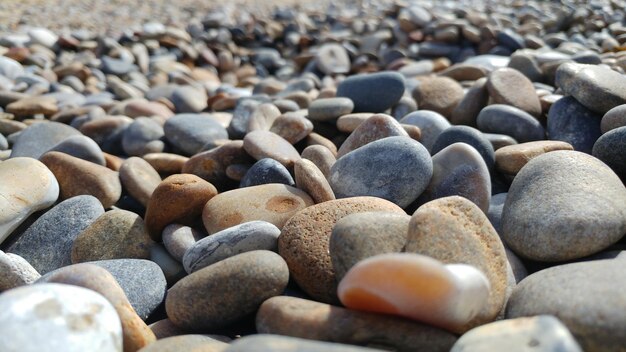 Full frame shot of pebbles at beach