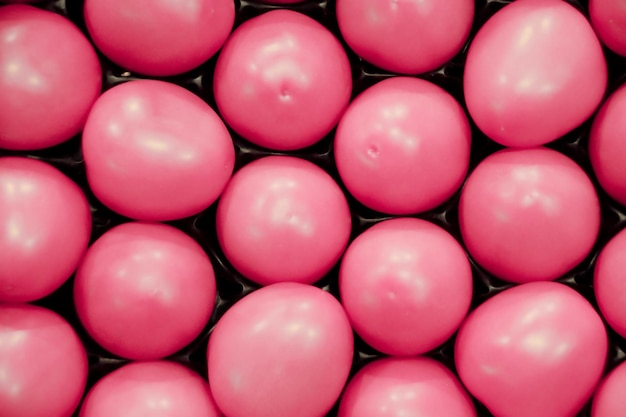 Photo full frame shot of pink tomatoes for sale in market