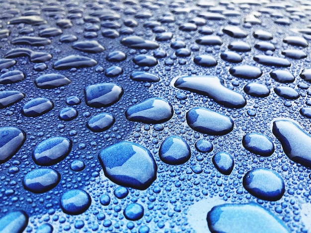 Photo full frame shot of raindrops on textured surface