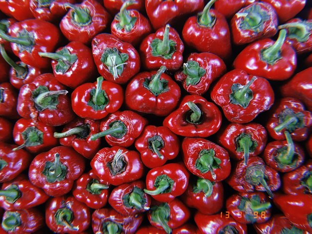 Photo full frame shot of red chili peppers for sale at market