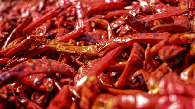 Photo full frame shot of red chili peppers for sale in market