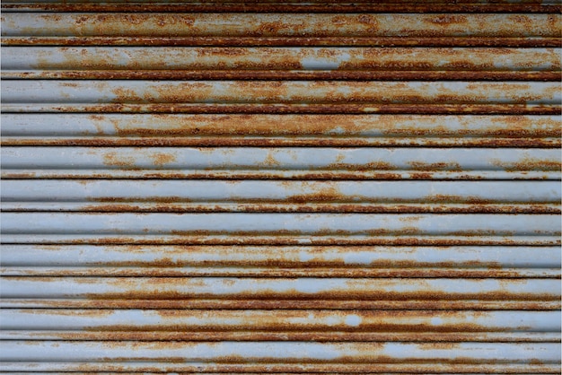 Photo full frame shot of rusty shutter