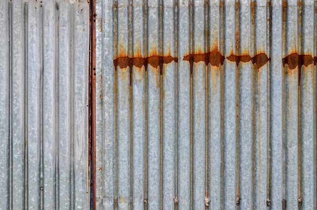 Photo full frame shot of rusty silver metallic wall