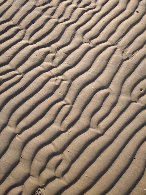 Photo full frame shot of sand at beach