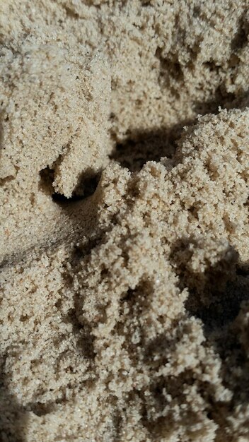 Foto fotografia completa della sabbia sulla spiaggia