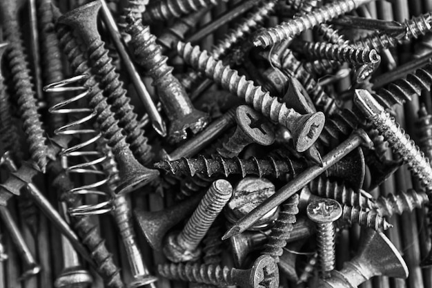 Photo full frame shot of screws on table