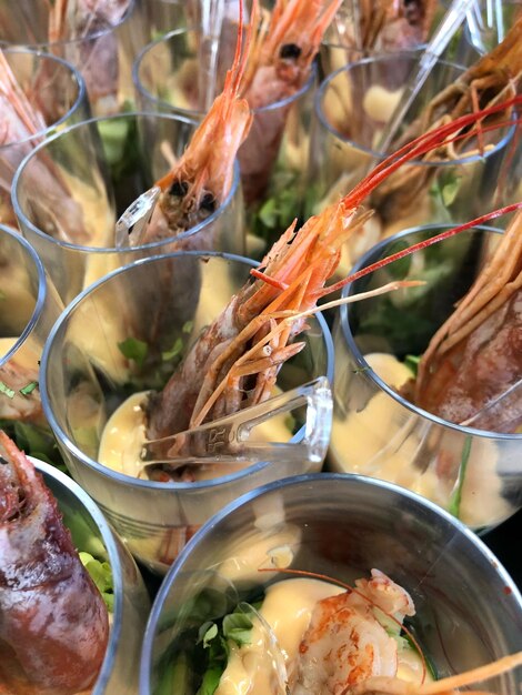 Full frame shot of seafood in container on table