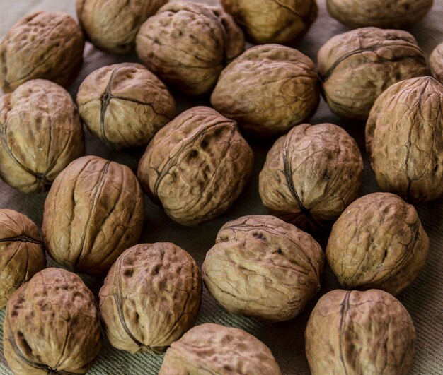 Full frame shot of walnuts on table