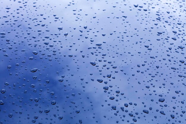 Full frame shot of water drops against blue sky