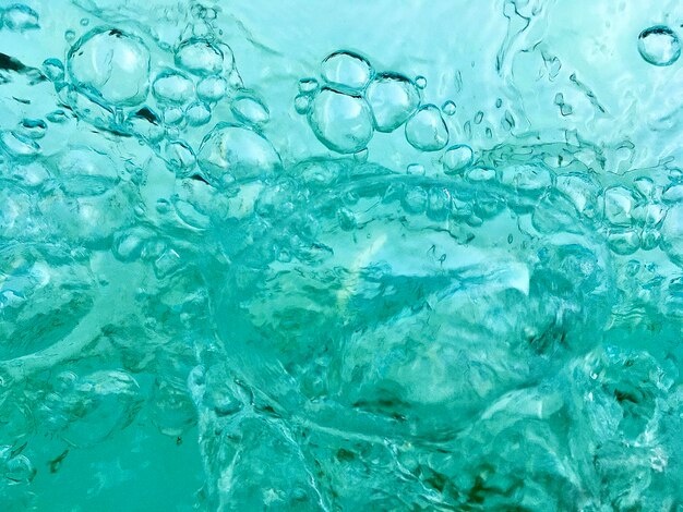 Full frame shot of water drops on swimming pool