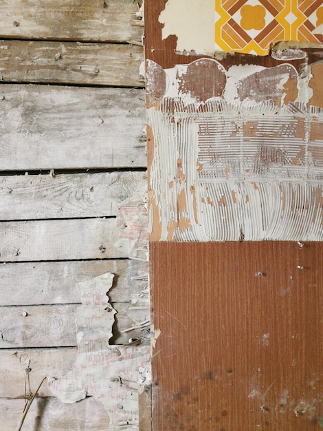 Foto fotografia completa di un muro di legno intemperato