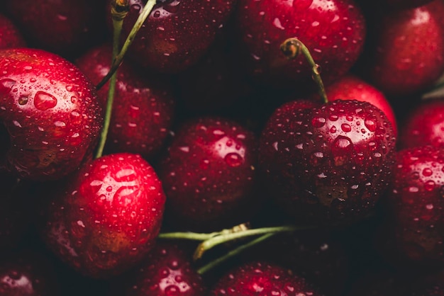full frame shot of wet cherries