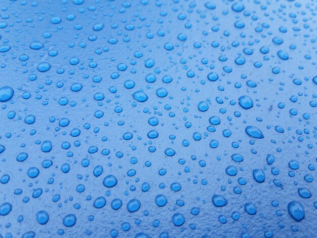 Full frame shot of wet glass during rainy season