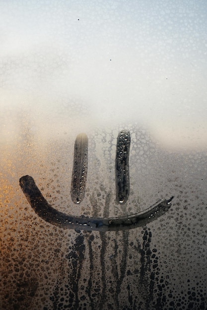 Full frame shot of wet glass window during winter