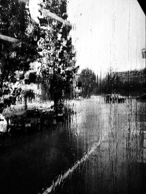 Photo full frame shot of wet vehicle window