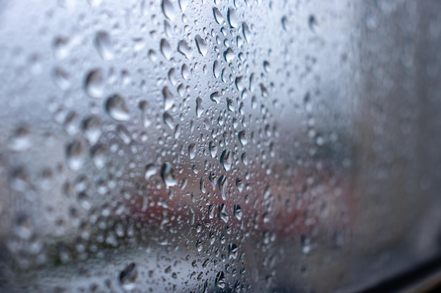 Photo full frame shot of wet window in rainy season