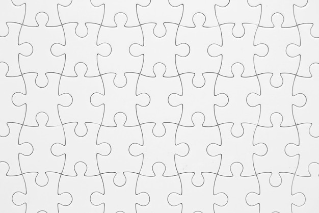 Photo full frame shot of white jigsaw puzzles