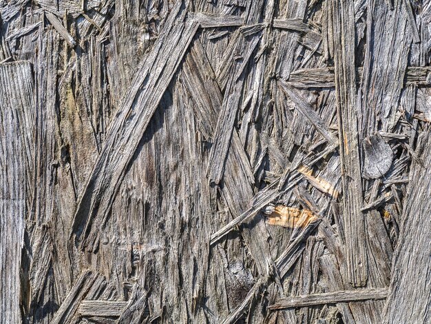 Photo full frame shot of wood shavings on sunny day