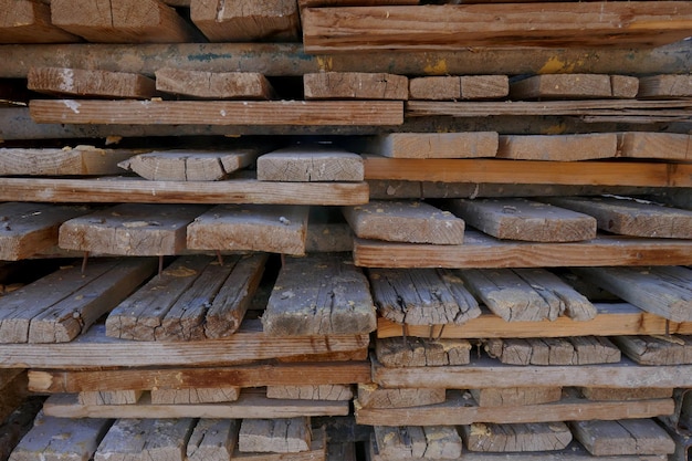 Photo full frame shot of wooden logs in forest