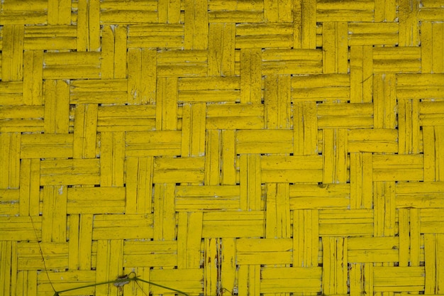 Full frame shot of yellow bamboo wall
