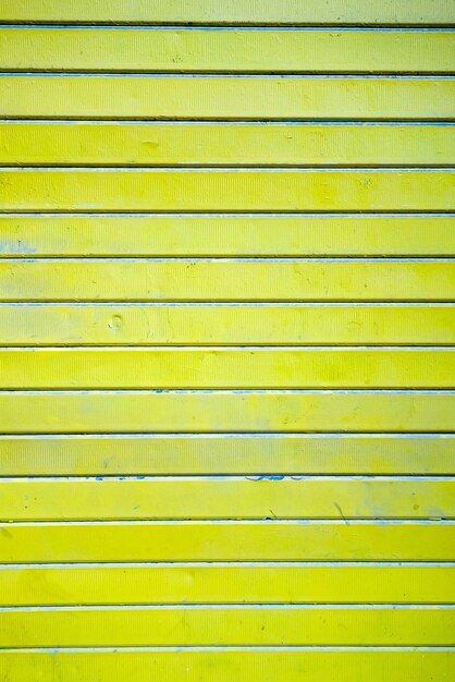 Full frame shot of yellow closed shutter