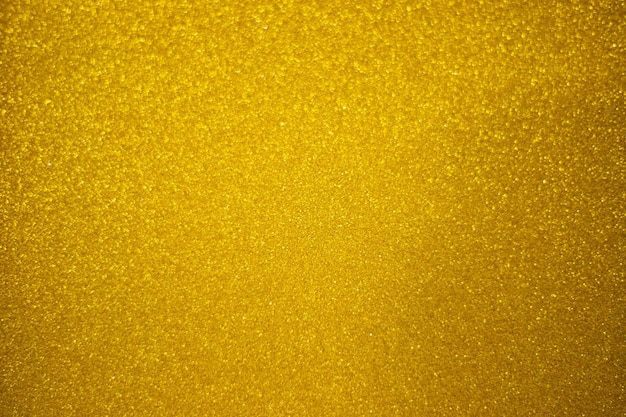 Full frame shot of yellow glitter