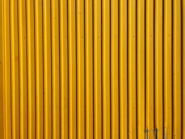 Full frame shot of yellow metallic wall