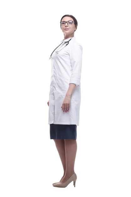 In full growth confident female doctor with a stethoscope